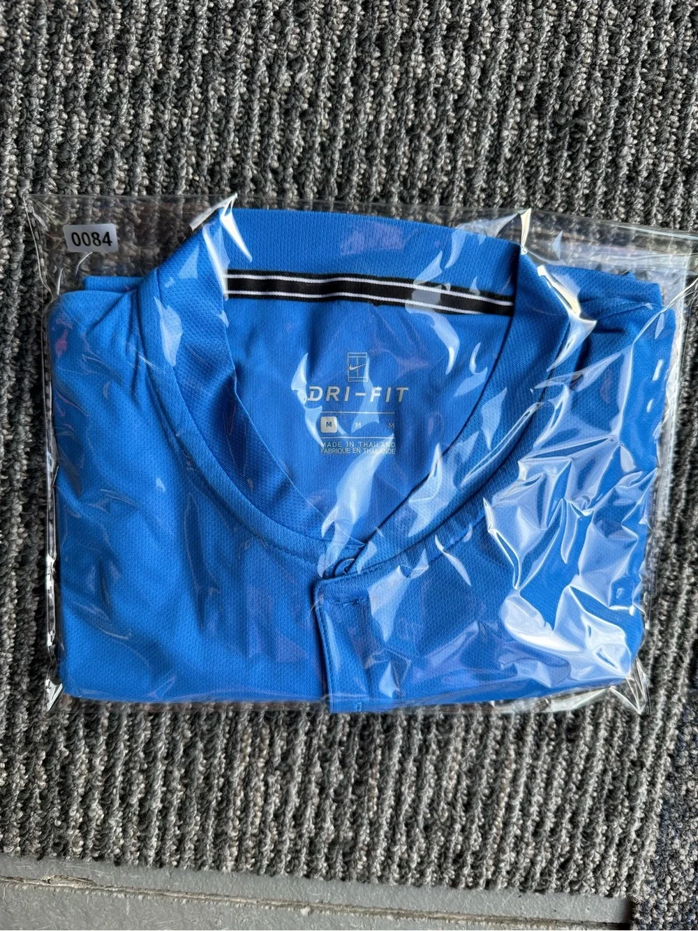 Nike Men’s Royal Blue Dri-FIT Polo with White Swoosh